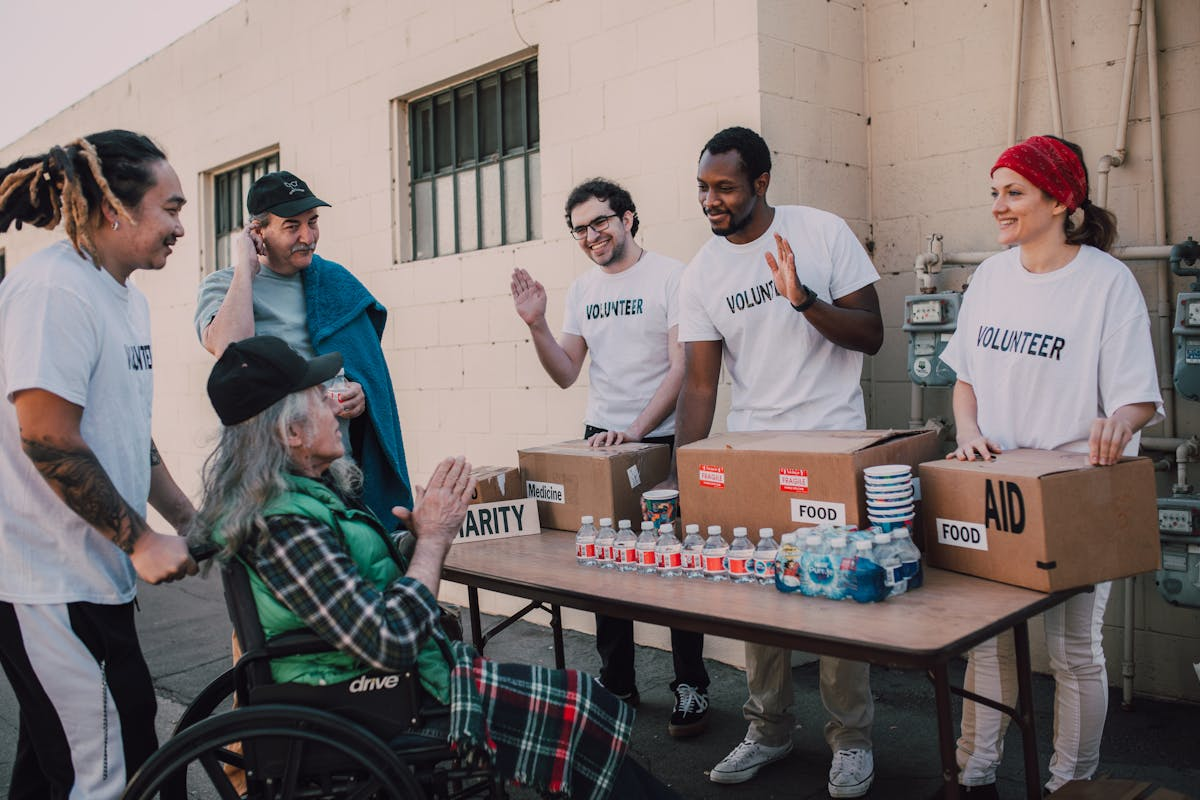 Volunteers packing food boxes for distribution