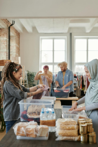 Volunteers sorting food donations at community food bank