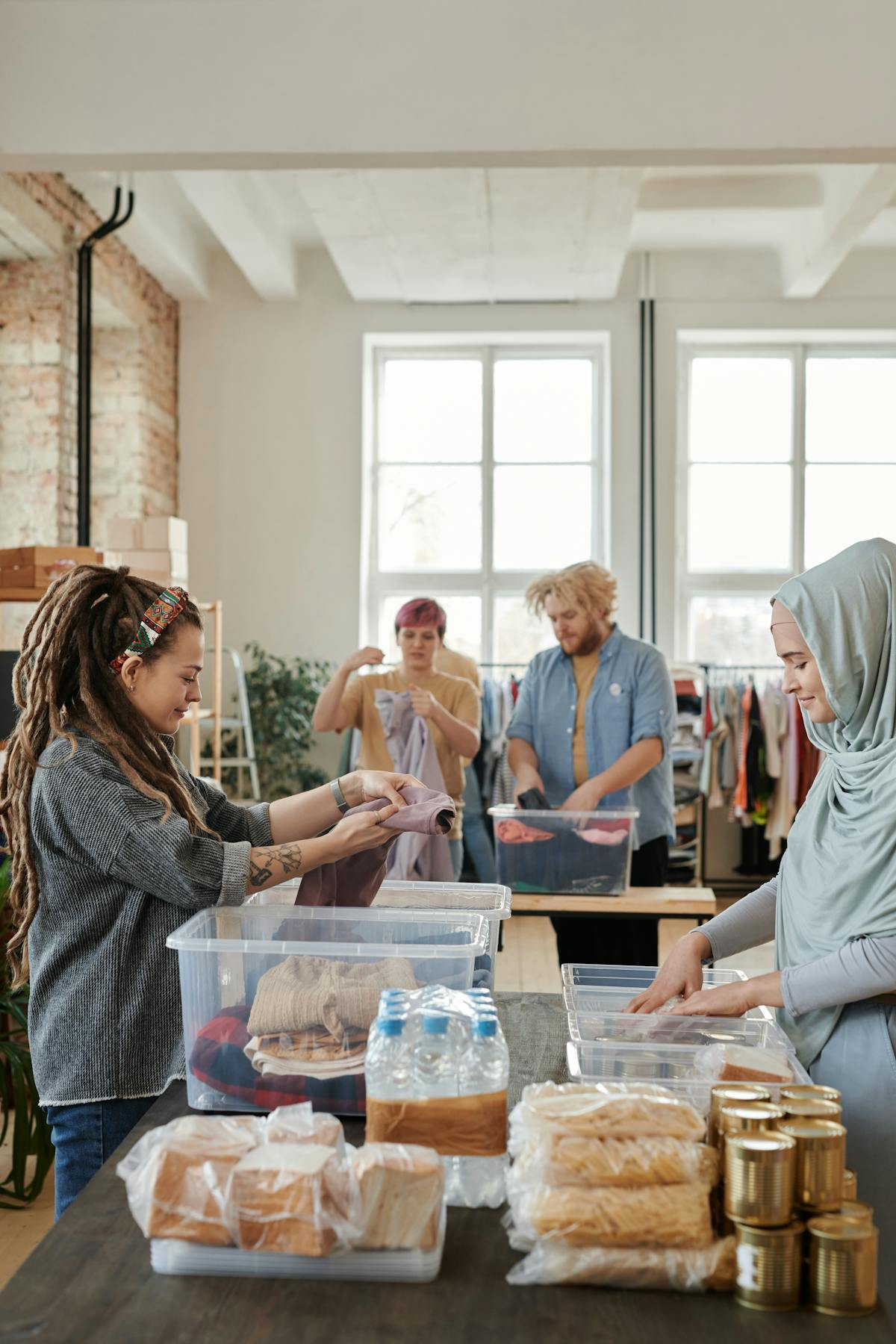 Volunteers sorting food donations at community food bank